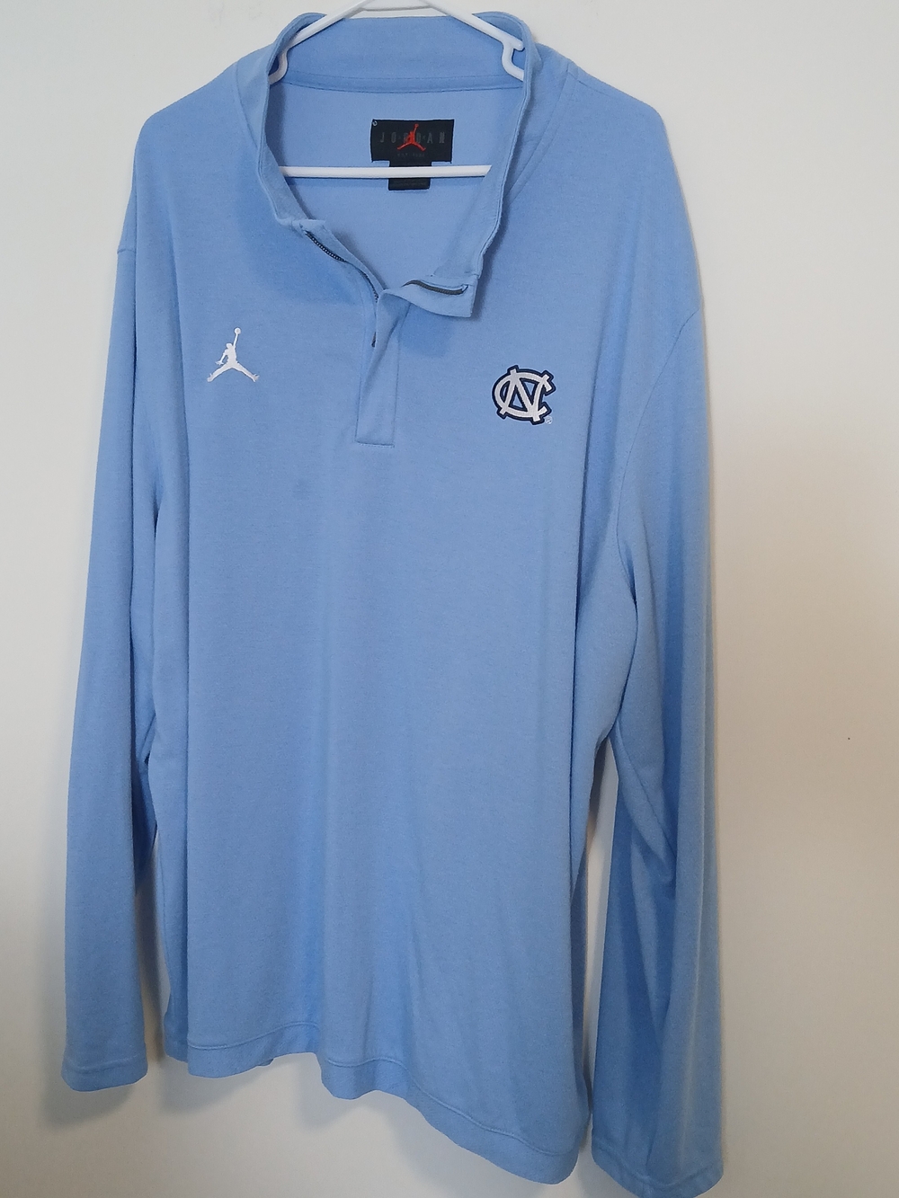 Jordan Light Blue Golf Polo with White Jumpman and UNC Patch